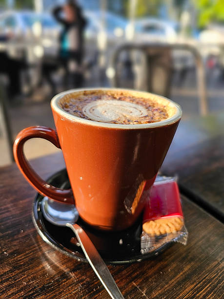 istock Cappuccino in a mug with blurred background 2231214905