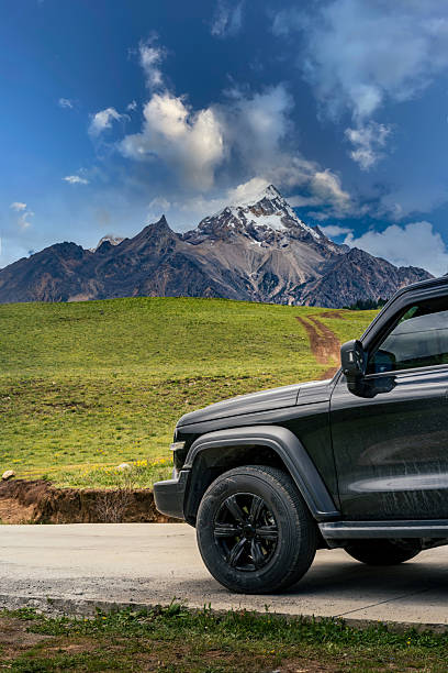 istock The cool off-road vehicle by the wilderness 2231216844
