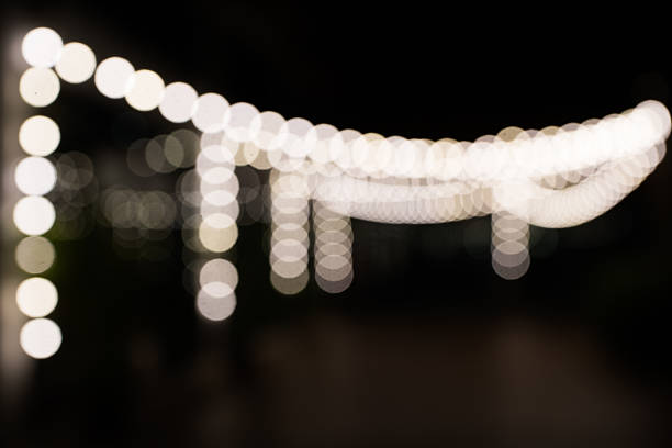 Defocused image of light bokhe for background material. Blurry lights