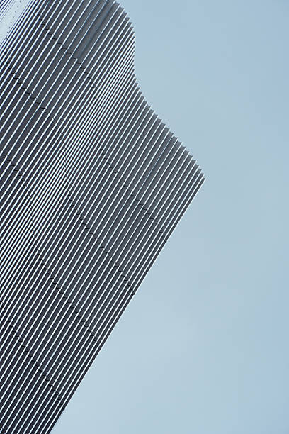 istock gray curve building with blue sky 2231229149