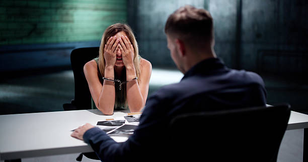 istock Female Lawyer Interrogates Suspect For Robbery Case 2231230312