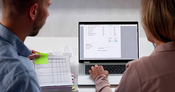 istock Happy Young Couple Managing Finances 2231230371