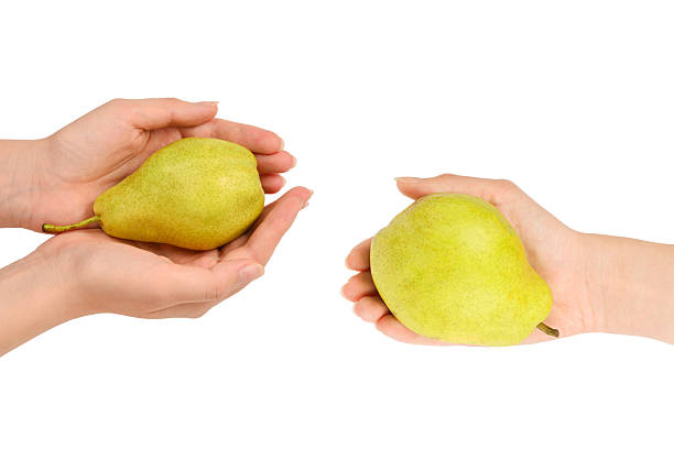 Sharing an apple symbolizes healthy living and friendship. This image emphasizes the beauty of healthy eating and togetherness.