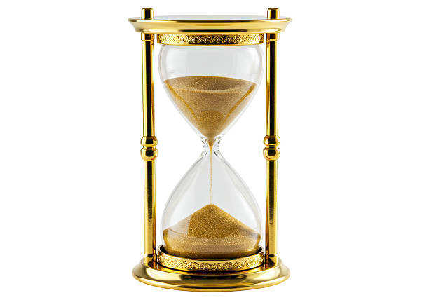istock Isolated Golden Hourglass with Flowing Sand 2231242267