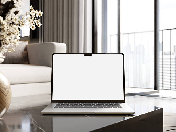 istock Minimalistic laptop on a stylish desk with a chic, neutral interior background, perfect for mockups. 2231242822