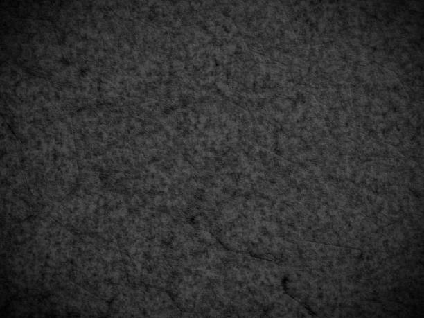 istock Dark granite texture with rich veins and natural patterns, ideal for design backgrounds. 2231242857