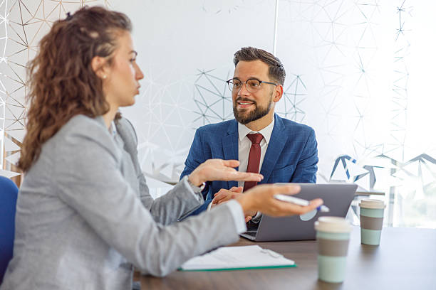 istock Business colleagues discussing during a meeting in a modern office 2231242998