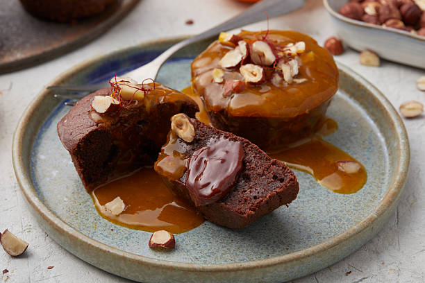 istock Chocolate cake with orange sauce 2231247108