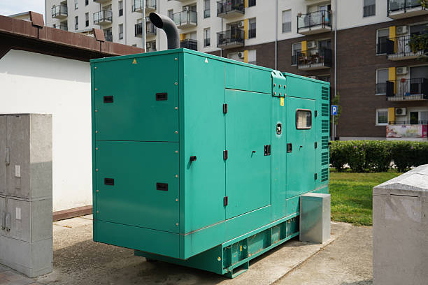 Green Industrial Electrical Box surrounded by houses