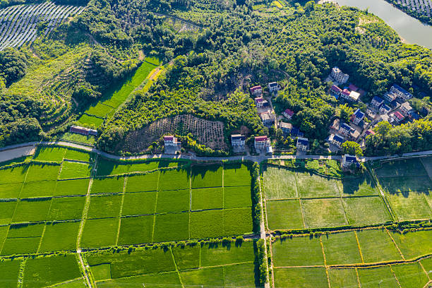 istock Green rural scenery, village overlooking 2231255628