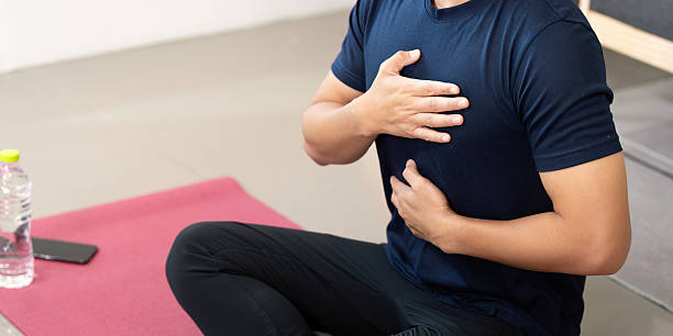 istock Mindfulness and Wellness. Man focusing on breath during meditation. 2231275332