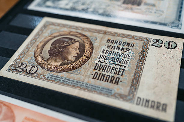 istock 20 Dinar Banknote From Yugoslavia On The Table 2231276363