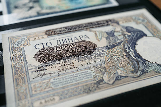 istock 100 Dinar Banknote From Serbia On The Table 2231276442