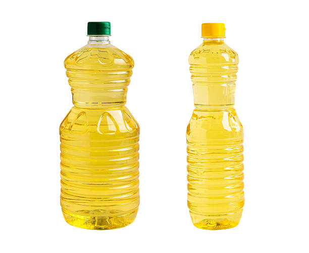 istock Vegetable oil in platic bottle isolated on white background. 2231279089
