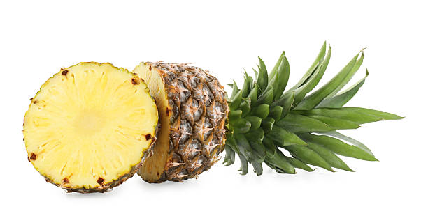 istock Pieces of ripe pineapple isolated on white 2231281900