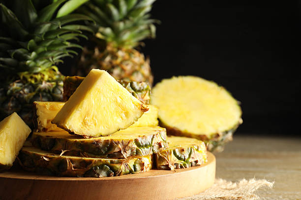 istock Slices of ripe pineapple on table, closeup 2231281907