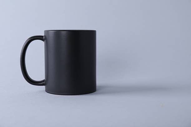 istock One blank black mug on light background. Mockup for design 2231282081