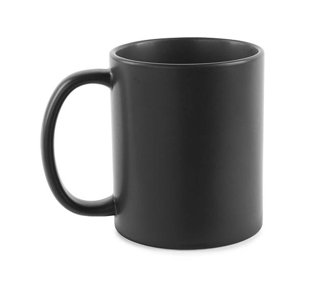 istock One blank black ceramic mug isolated on white. Mockup for design 2231282158