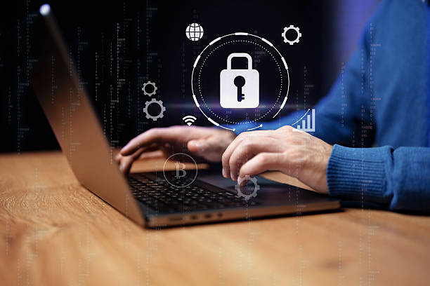 istock Professional man presenting a digital pad with security symbols in a high-tech environment 2231284864