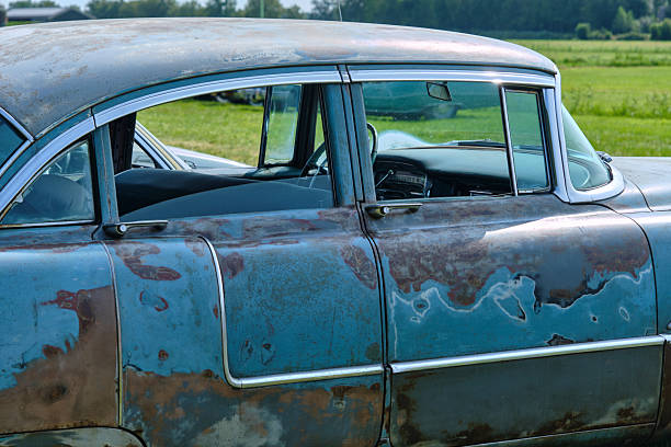 Ruinerwold, Netherlands; August 17, 2024: Patina Cadillac Series 62 from 1950s displayed at Oldtimerdag Ruinerwold, showing weathered paint, chrome trim and interior details.
