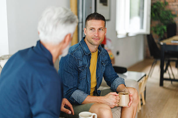 istock Father and Son Bonding at Home with Coffee 2231285676