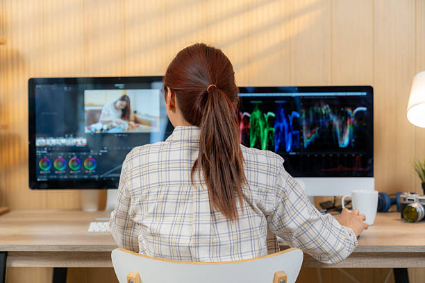 istock Freelance Female Photographer Editing Photos at Home Studio Workspace 2231288019