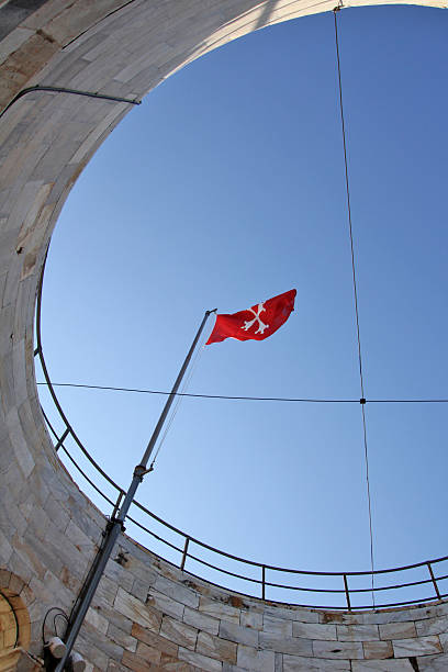 The Ancient flag of Republic of Pisa on the top of tower