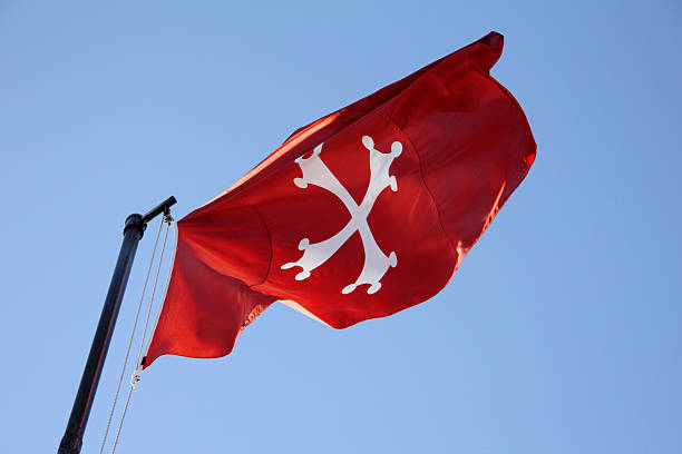 The Ancient flag of Republic of Pisa on the top of tower
