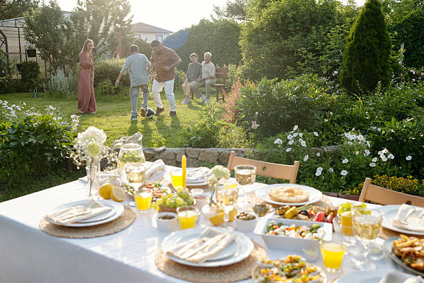 istock Holiday Table set with Food and Drinks Outdoors 2231289438