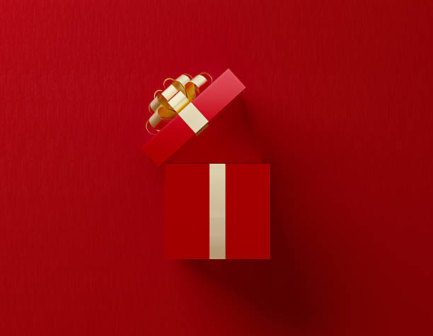 Red Gift Box On Red Background - Christmas Present And Gift Concept