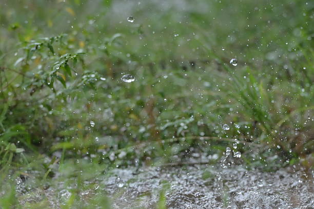 istock Raindrops falling from the roof of a house 2231294073