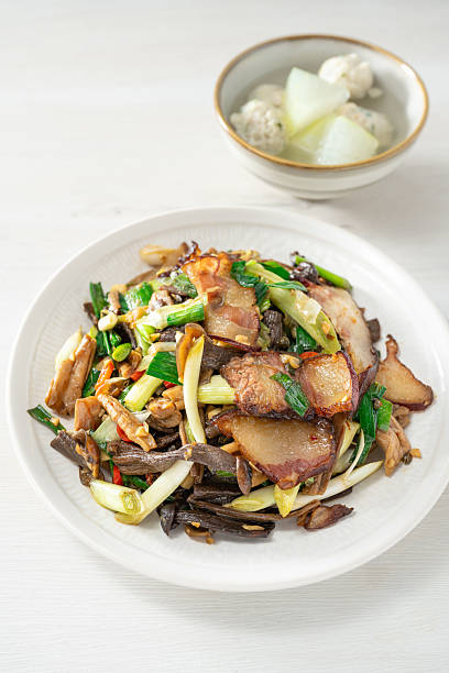 Stir-fried bacon with alpine velvet mushrooms