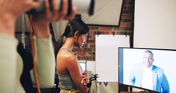 istock Computer, photographer and woman in studio to check results for editing, selection and process. Photography, creative and person with male model on screen for post production, planning and design 2231299064