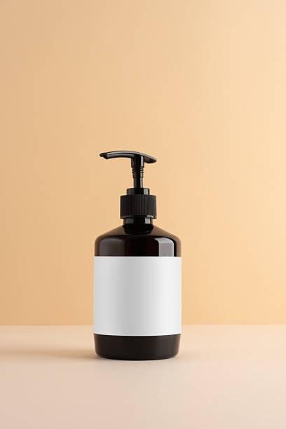 istock Cosmetic pump bottle mockup with blank label 2231301724