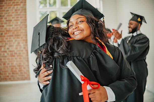 istock Celebrating achievement and friendships among graduates during university commencement ceremony 2231304131