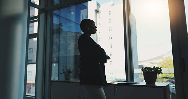istock Thinking, window and business woman in office for proposal ideas, finance planning and problem solving. Corporate, consultant and entrepreneur vision with professional view, solution and decision 2231306661