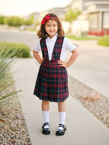 Little Girl in a School Uniform
