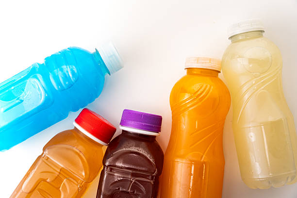 Colorful isotonic beverages delivering hydration, boosting energy with zingy flavors for fitness enthusiasts and athletes performing intense workouts