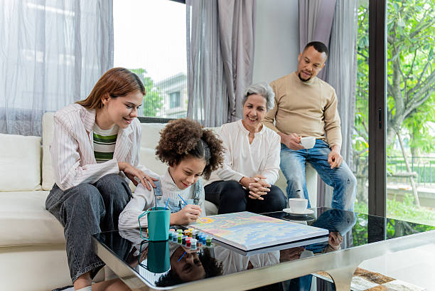 istock Upscale Family Enjoying Creative Time Together at Home 2231309627