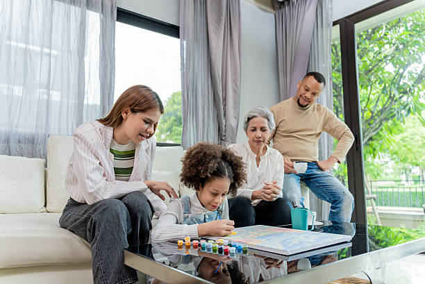 istock Upscale Family Enjoying Creative Time Together at Home 2231309628