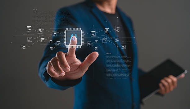 istock A professional individual interacts with a digital interface, showcasing AI technology and data visualization in a modern business context. 2231311915