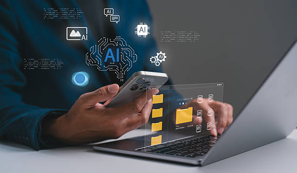 istock A person using a smartphone and laptop with digital icons representing artificial intelligence and data management. 2231311926