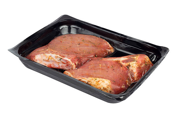 istock marinated steak in vacuum packaging, isolated from the background 2231313110