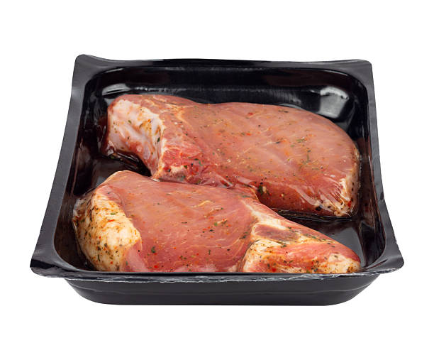 istock marinated steak in vacuum packaging, isolated from the background 2231313111