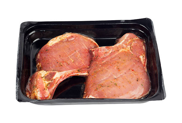 istock marinated steak in vacuum packaging, isolated from the background 2231313115