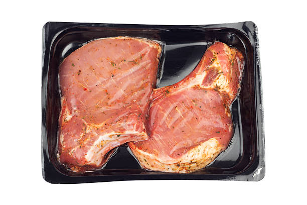 istock marinated steak in vacuum packaging, isolated from the background 2231313153