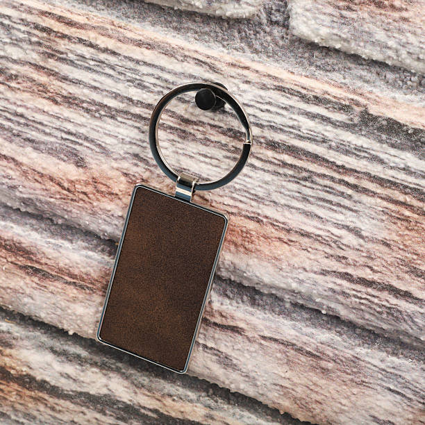 istock Metal and leather keychains. Colorful one side leather; Square, rectangle and circle shaped key rings. Concept shots, 2231317456