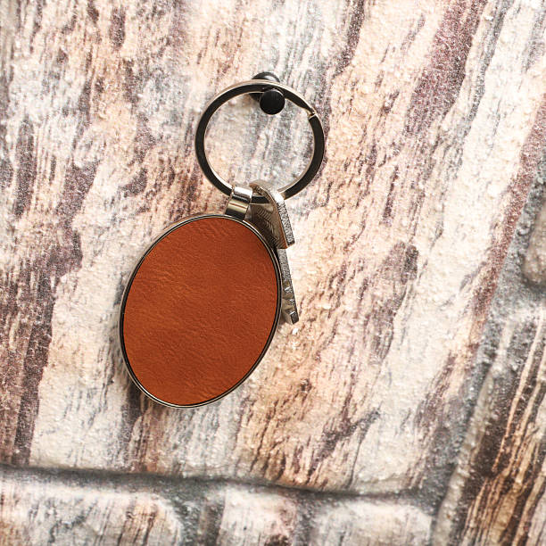 istock Metal and leather keychains. Colorful one side leather; Square, rectangle and circle shaped key rings. Concept shots, 2231317810