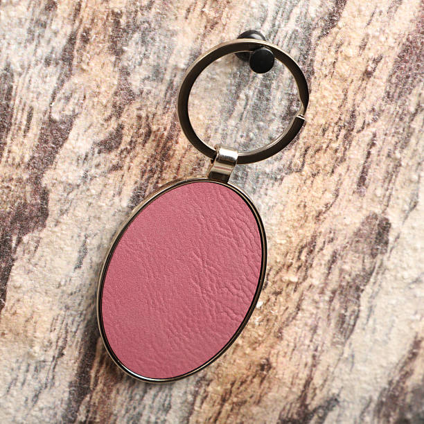 istock Metal and leather keychains. Colorful one side leather; Square, rectangle and circle shaped key rings. Concept shots, 2231317832