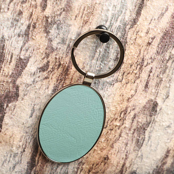 istock Metal and leather keychains. Colorful one side leather; Square, rectangle and circle shaped key rings. Concept shots, 2231317850